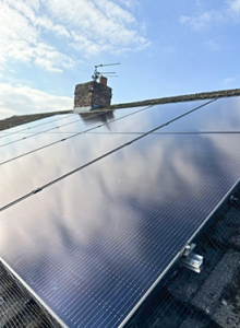 Solar panel on a roof of a house