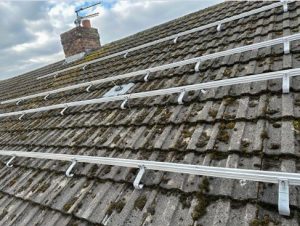 Installing panel on a roof of a house